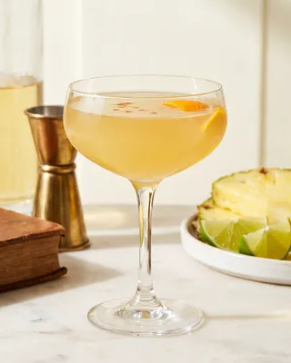 Pisco Punch in a coupe with orange