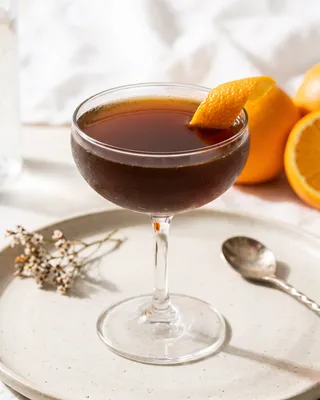 Toronto Cocktail in a coupe with orange