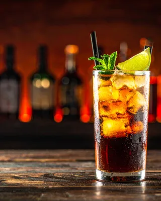Fernet con Cola in a highball glass