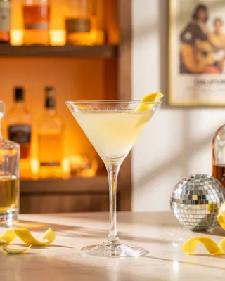 Lemon Drop Martini in a martini glass with lemon