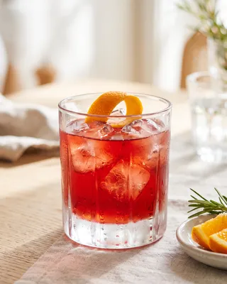 Non-alcoholic Negroni (Nogroni) in a rocks glass with orange