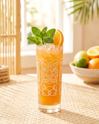 Scorpion in a tiki mug with mint and orange