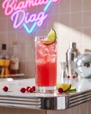 Woo Woo in a highball glass with lime