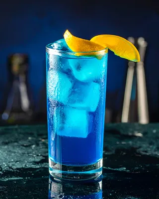 Polar Bear cocktail in a glass with a lemon wheel