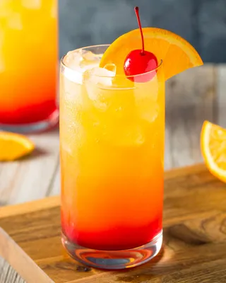 Tequila Sunrise in a highball glass