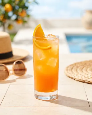 Screwdriver in a highball glass with orange
