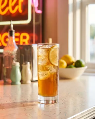 Long Island Iced Tea in a Collins glass with lemon