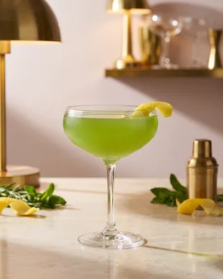 Champs-Élysées in a coupe with lemon