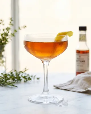 Harvard Cocktail in a coupe with lemon