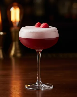 Chambord Sour in a coupe