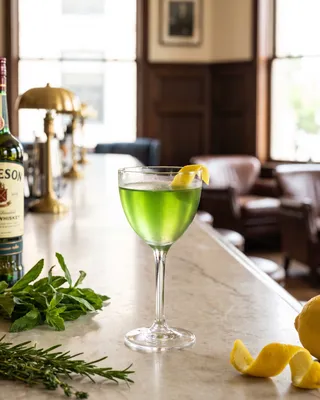 Tipperary in a Nick & Nora glass with lemon